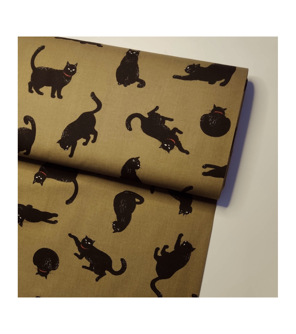 Japanese Fabric 'Cats' over kaki green background.