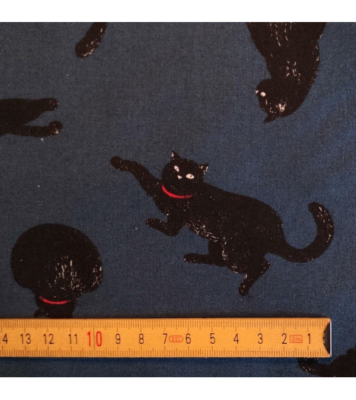 Japanese Fabric 'Cats' over lead blue background.
