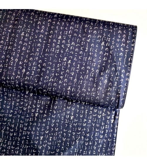 Japanese fabric. Hiragana in silver over navy blue.