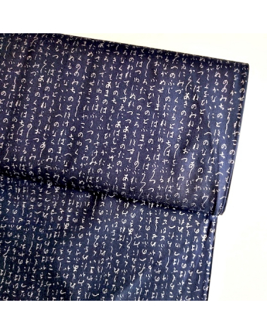 Japanese fabric. Hiragana in silver over navy blue.