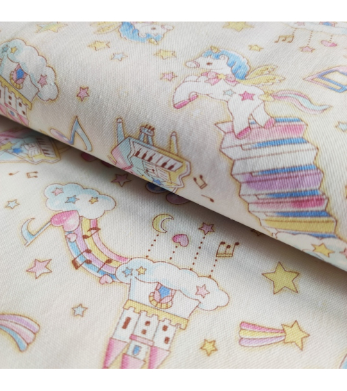 Tela japonesa Oxford fino "Unicornios musicales" con fondo vainilla.