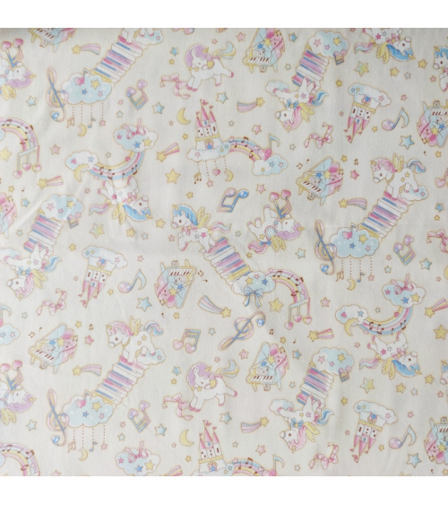 Tela japonesa Oxford fino "Unicornios musicales" con fondo vainilla.