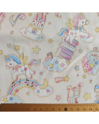 Tela japonesa Oxford fino "Unicornios musicales" con fondo vainilla.