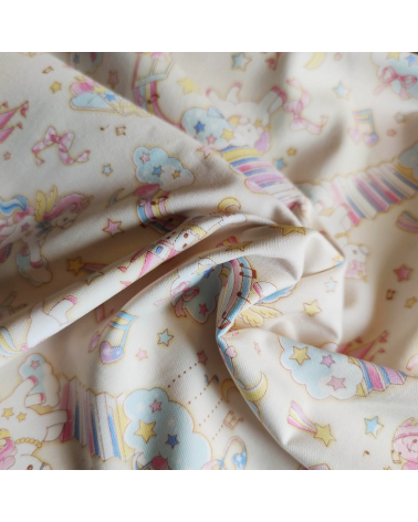 Tela japonesa Oxford fino "Unicornios musicales" con fondo vainilla.