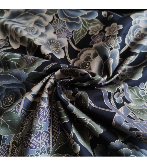Japanese cotton fabric. Bluish roses over black.