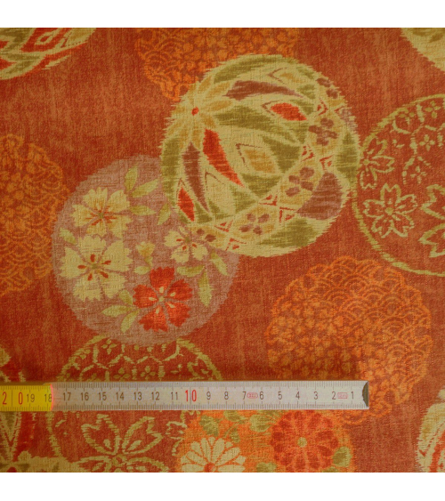 Temari sobre fondo rojo profundo vintage