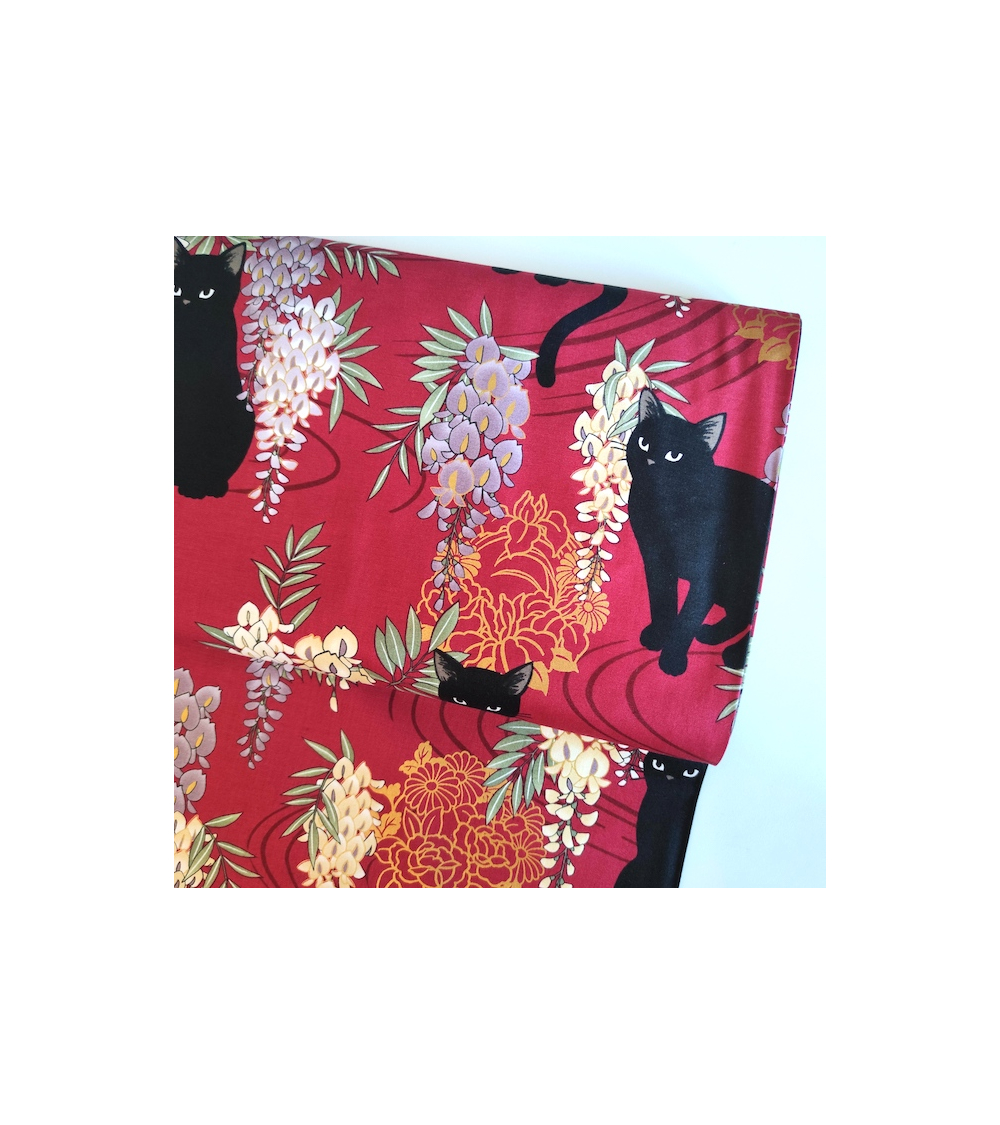 Japanese fabric. Black cats with Wisteria. Red background