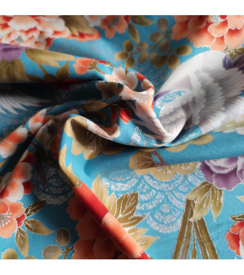 Tela japonesa "Tsuru to botan" en turquesa con detalles en plata