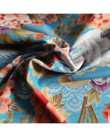 Tela japonesa "Tsuru to botan" en turquesa con detalles en plata