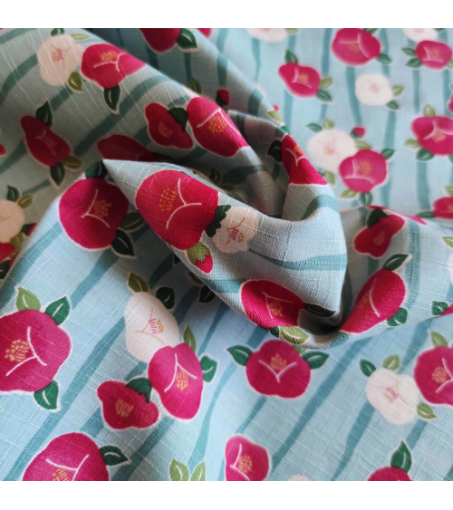 Tela de dobby japonés "Camelias" (Tsubaki) en azul claro.