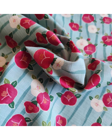 Tela de dobby japonés "Camelias" (Tsubaki) en azul claro.