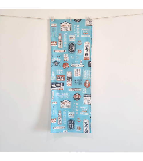 Tenugui (Pañuelo japonés) "Onsen" (32 cm x 90 cm) en azul claro.