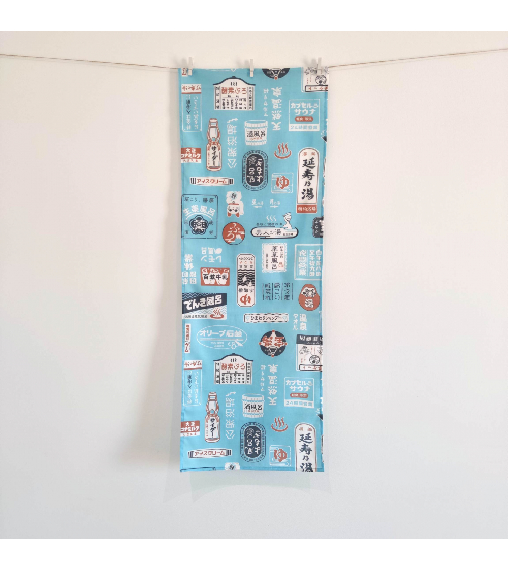 Tenugui (Pañuelo japonés) "Onsen" (32 cm x 90 cm) en azul claro.