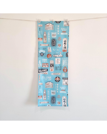 Tenugui (Pañuelo japonés) "Onsen" (32 cm x 90 cm) en azul claro.