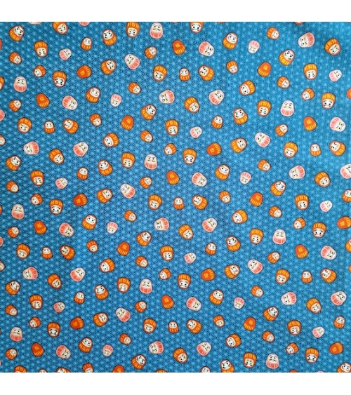 Japanese 100% cotton fabric "Darumas and asanoha" in blue.