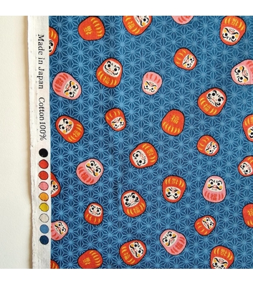 Japanese 100% cotton fabric "Darumas and asanoha" in blue.