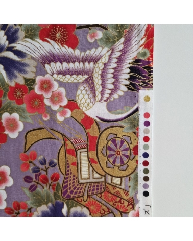 Japanese fabric. Multicolored cranes (tsuru) and flowers (hana) over lilac background, outlined in gold.