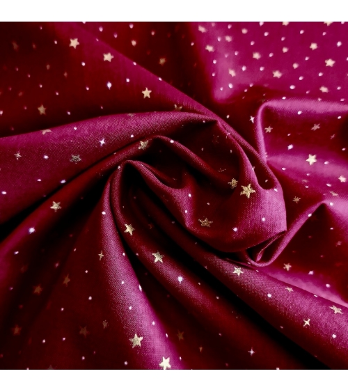 Japanese fabric with golden stars on a cherry red background