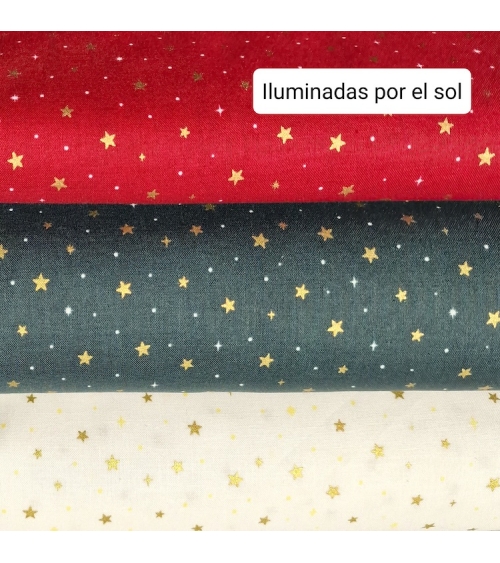 Tela japonesa de estrellitas doradas sobre fondo blanco