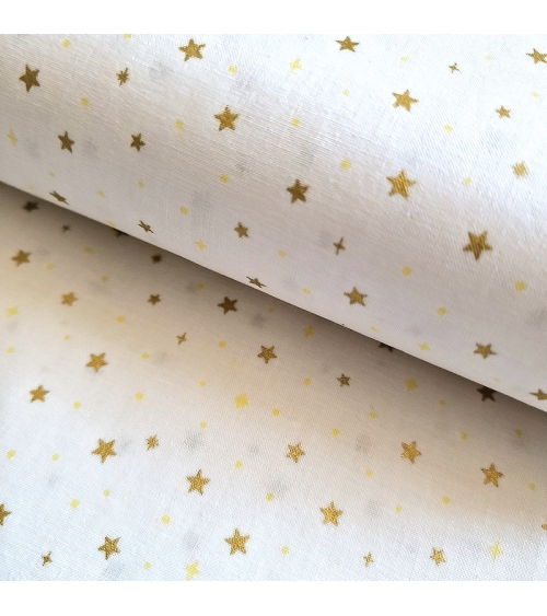 Tela japonesa de estrellitas doradas sobre fondo blanco