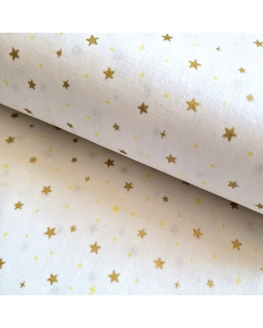 Tela japonesa de estrellitas doradas sobre fondo blanco