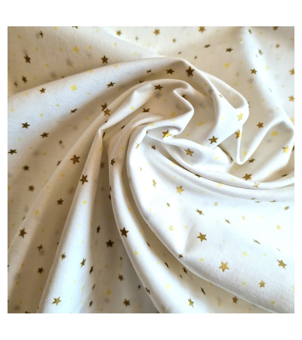 Japanese fabric with golden stars on a white background
