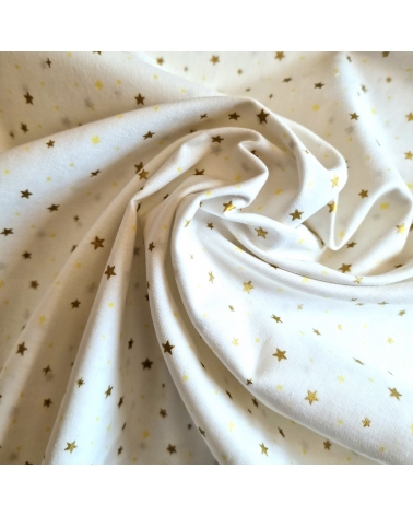 Tela japonesa de estrellitas doradas sobre fondo blanco