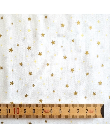 Japanese fabric with golden stars on a white background