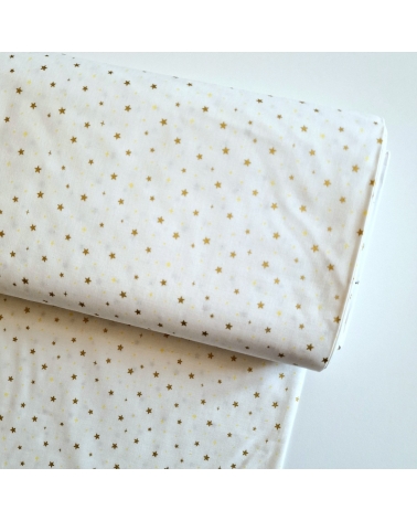 Tela japonesa de estrellitas doradas sobre fondo blanco