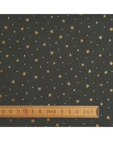 Tela japonesa de estrellitas doradas sobre fondo verde abeto