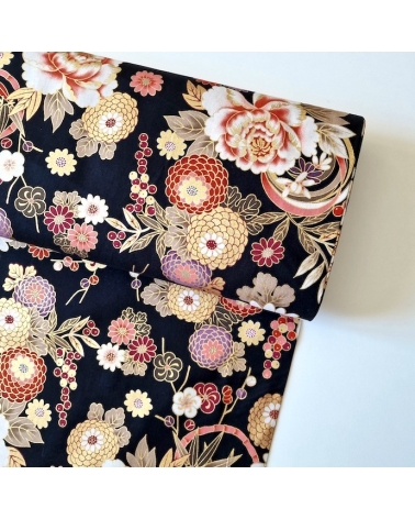 Japanese fabric 'Flowers and bamboo' in autumn colours on black.