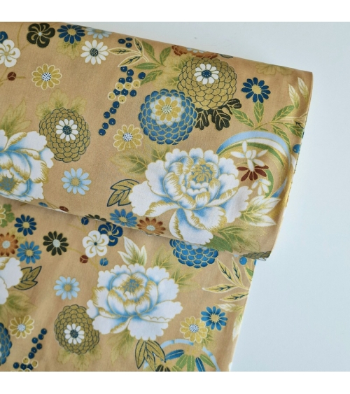 Japanese fabric 'Flowers and bamboo' in bluish colours on tan.