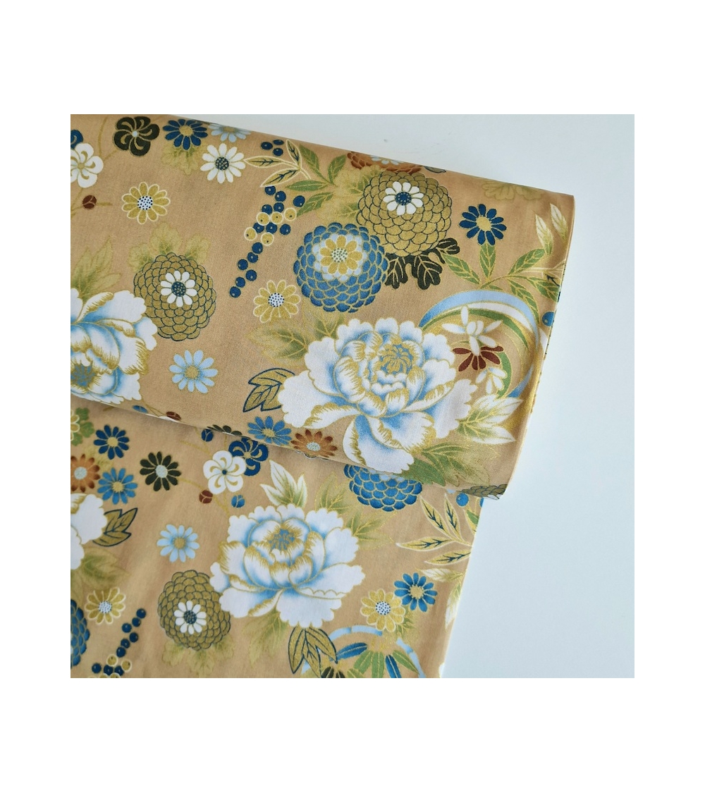 Japanese fabric 'Flowers and bamboo' in bluish colours on tan.