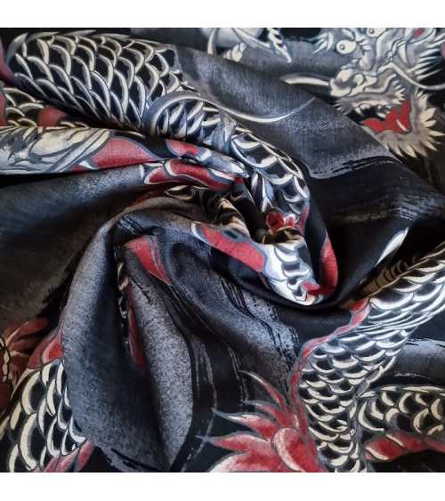 Japanese dobby fabric with large dragons in black.