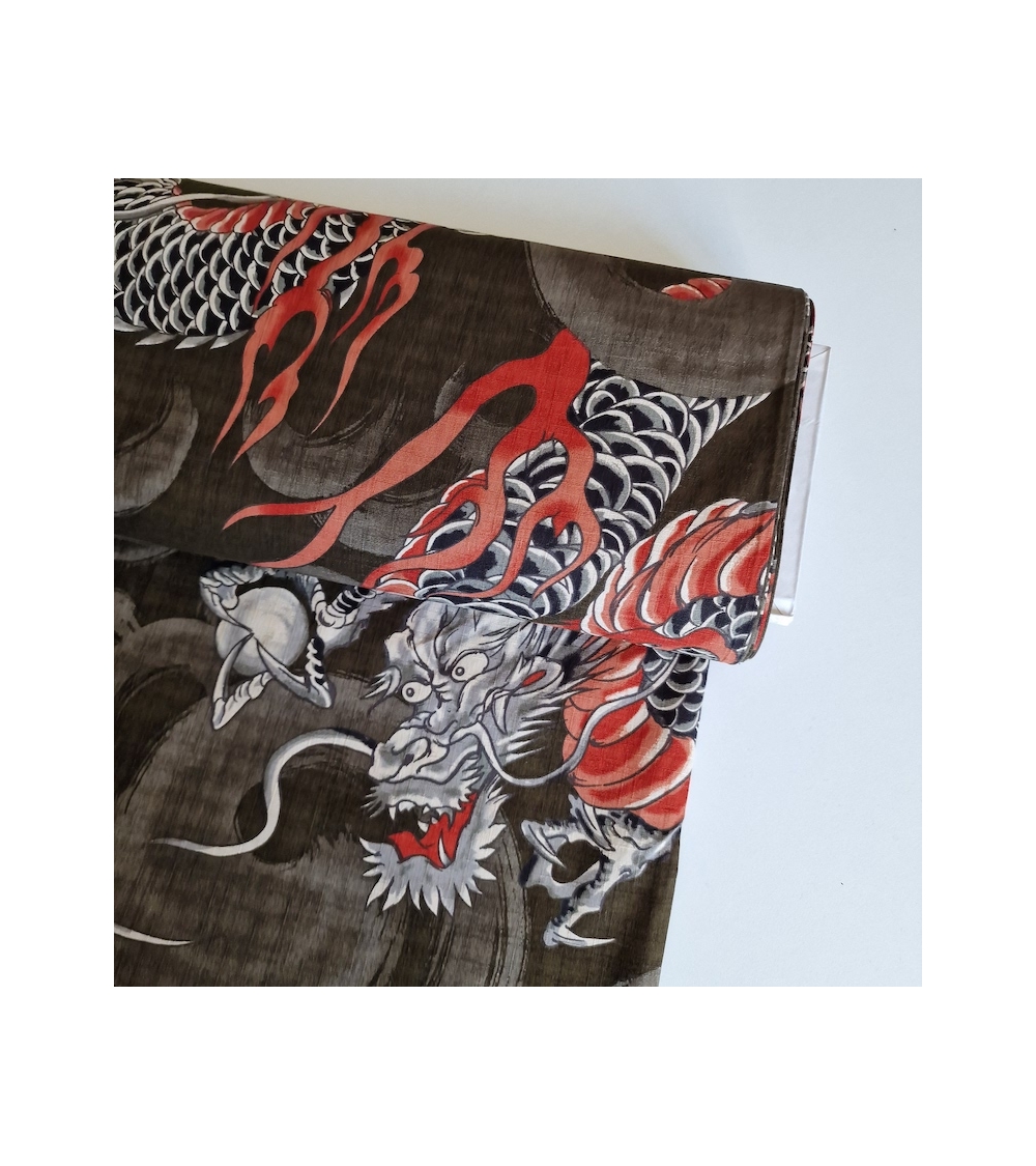Japanese dobby fabric with large dragons in taupe.