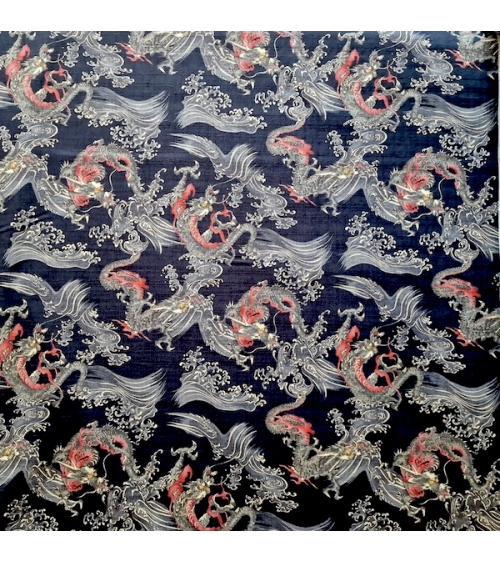 Japanese dobby fabric with small dragons and waves in black.