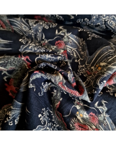 Japanese dobby fabric with small dragons and waves in black.