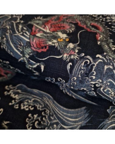 Japanese dobby fabric with small dragons and waves in black.