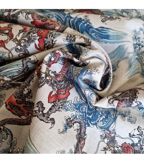 Tela dobby japonés Dragones pequeños y olas en blanco azulado.