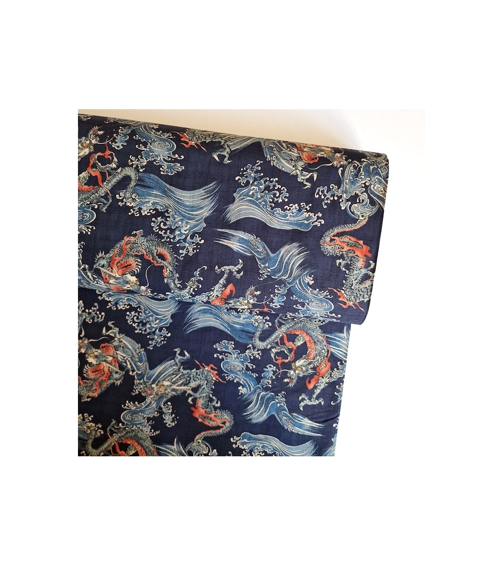 Tela dobby japonés Dragones pequeños y olas en azul.