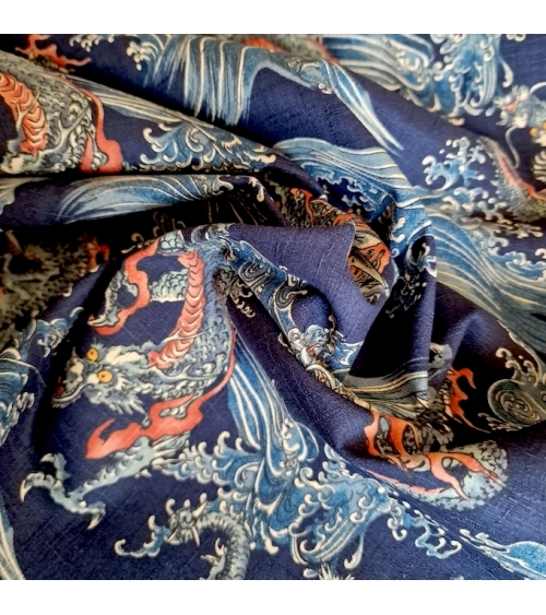 Tela dobby japonés Dragones pequeños y olas en azul.