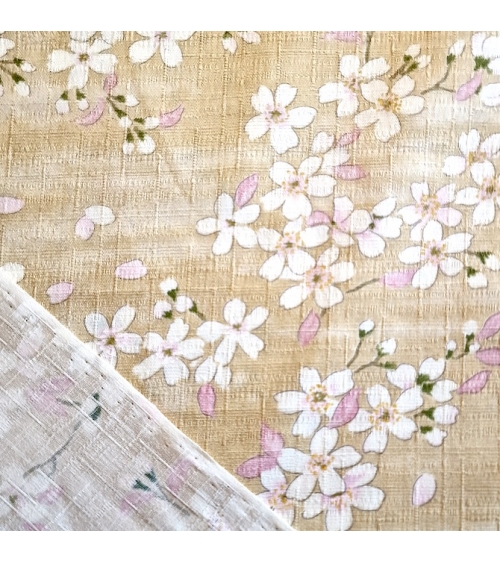 Japanese fabric "Sakuras" with beige background, in cotton dobby.