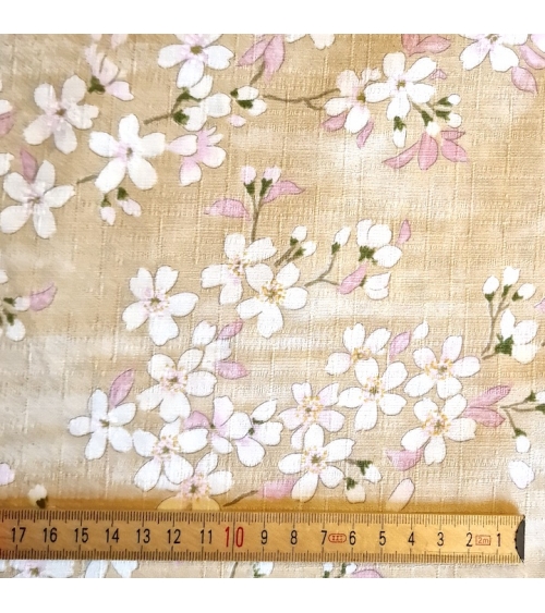 Japanese fabric "Sakuras" with beige background, in cotton dobby.