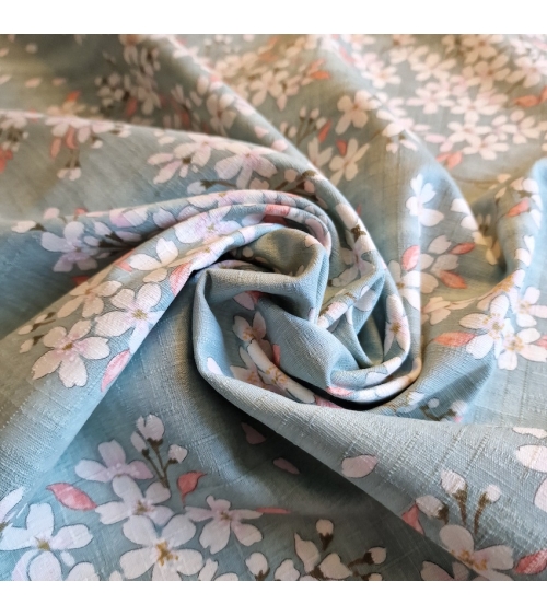 Tela japonesa "Sakuras" con fondo aqua, en dobby de algodón