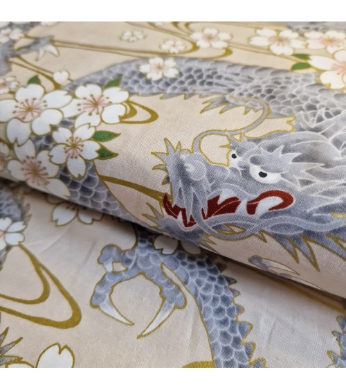 Japanese fabric "Ryu to sakura" (Dragon and cherry blossom) in ivory. 100% cotton.