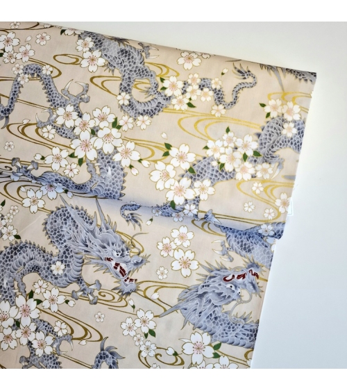 Japanese fabric "Ryu to sakura" (Dragon and cherry blossom) in ivory. 100% cotton.