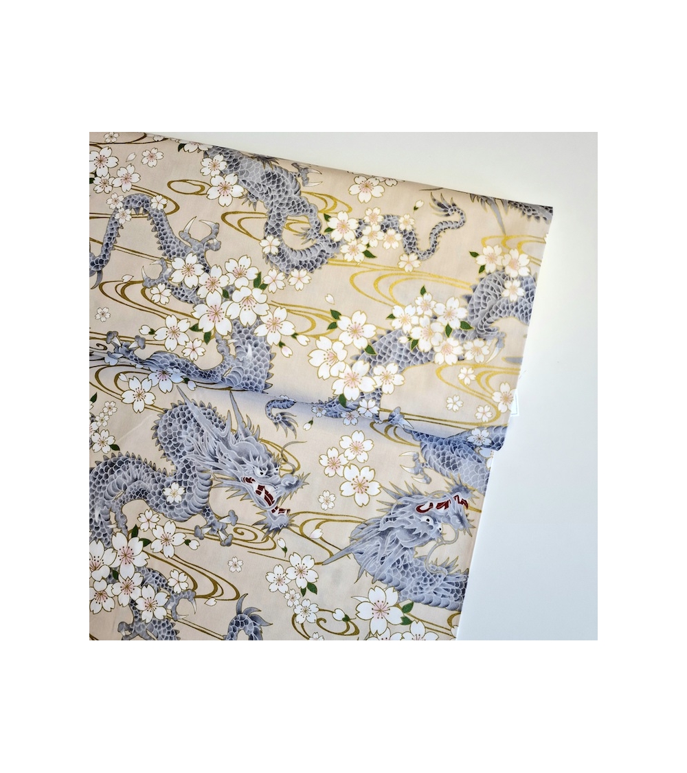 Japanese fabric "Ryu to sakura" (Dragon and cherry blossom) in ivory. 100% cotton.