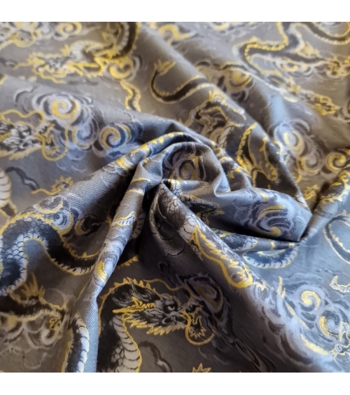 Japanese fabric 'Flying dragons' in grey. 100% cotton.