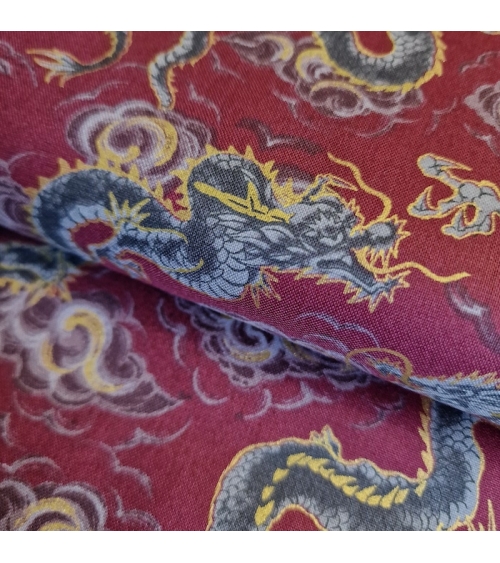 Japanese fabric 'Flying dragons' in burgundy red. 100% cotton.