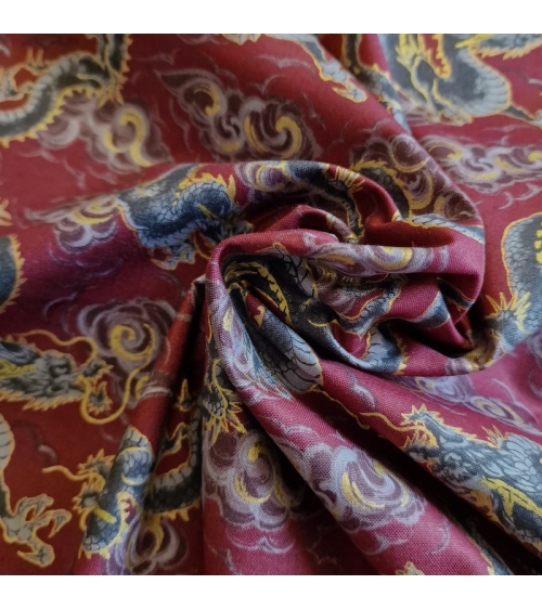 Japanese fabric 'Flying dragons' in burgundy red. 100% cotton.
